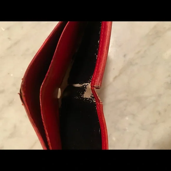 Red leather Louis Vuitton wallet